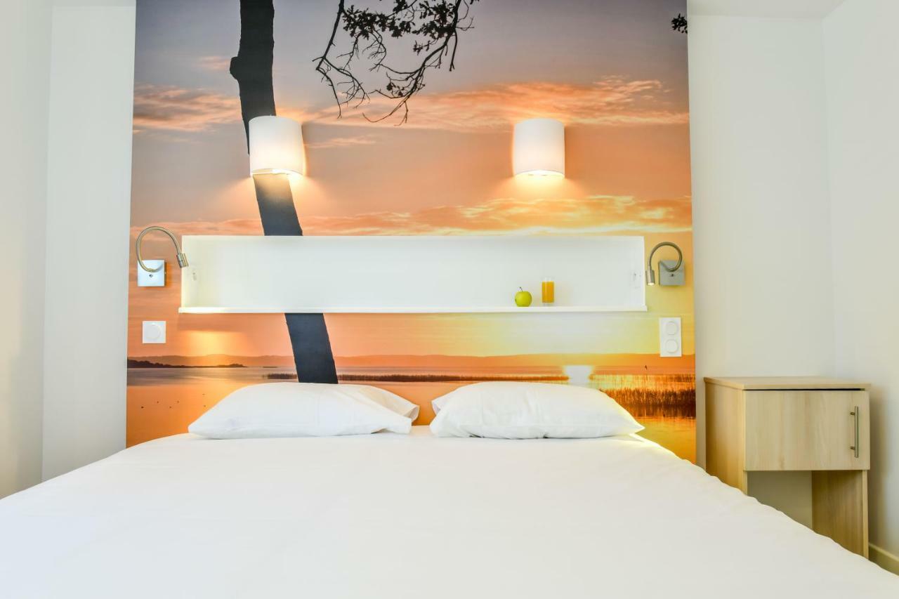Les Vagues Hotel Restaurant Biscarrosse-Plage Exterior foto